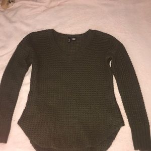 Green knitted sweater